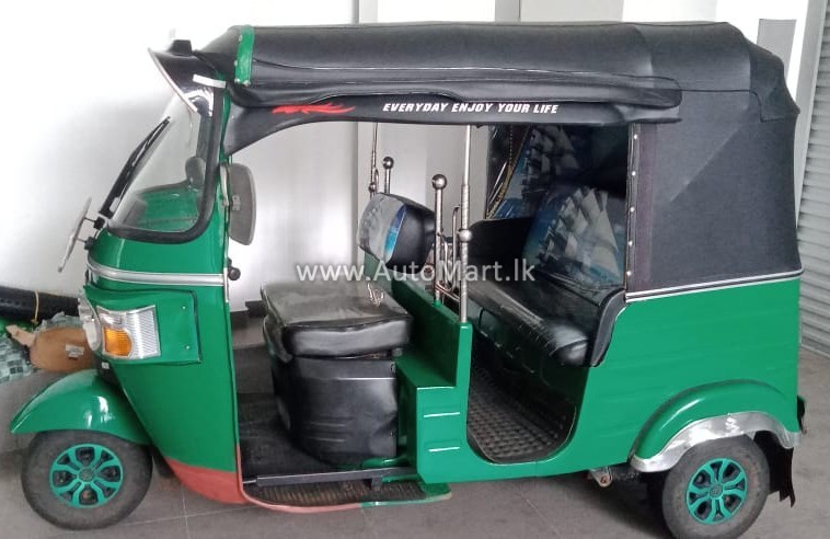 bajaj 4 stroke three wheeler price